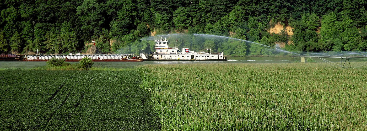 Fields being irrigated in front of Ingram barge